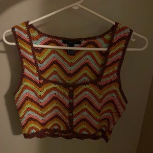 Colourful knitted vest with undoable buttons